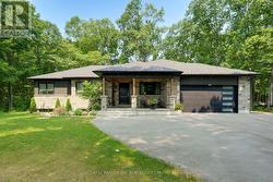 34 OAKWOOD AVENUE Tiny, ON L9M 0J2