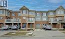 View of front of property with a balcony, driveway, brick siding, and a garage - 9 Outlook Terrace, Kitchener, ON  - Outdoor With Balcony With Facade 