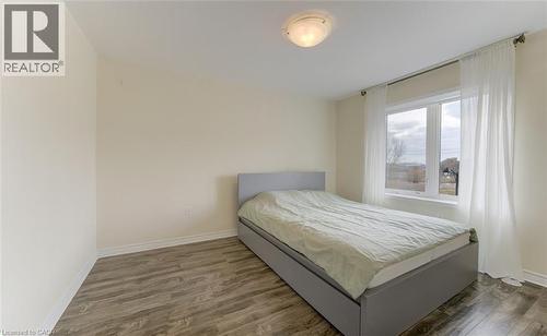 Bedroom featuring dark wood-style floors - 9 Outlook Terrace, Kitchener, ON - Indoor Photo Showing Bedroom