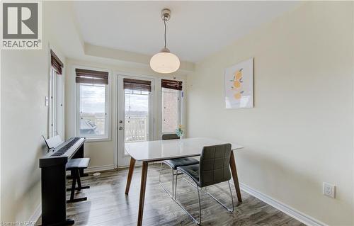 Dining area featuring wood finished floors and baseboards - 9 Outlook Terrace, Kitchener, ON - Indoor Photo Showing Dining Room