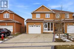 154 TOBA CRESCENT Brampton, ON L6Z 4R9
