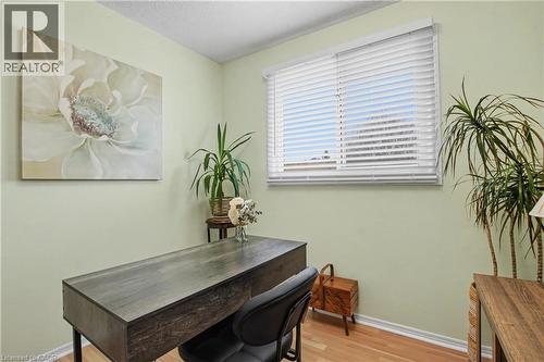 Office area featuring light wood-type flooring and a textured ceiling - 21 Greystone Crescent, St. Catharines, ON - Indoor