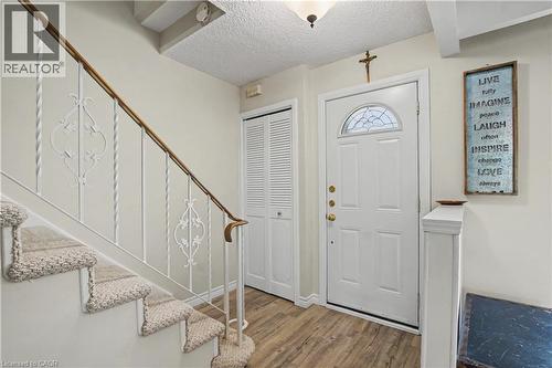 Entrance foyer featuring a textured ceiling and light wood-type flooring - 21 Greystone Crescent, St. Catharines, ON - Indoor Photo Showing Other Room