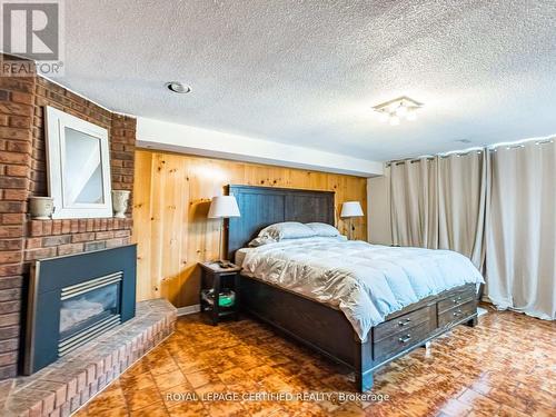 7497 Middleshire Drive, Mississauga, ON - Indoor Photo Showing Bedroom With Fireplace