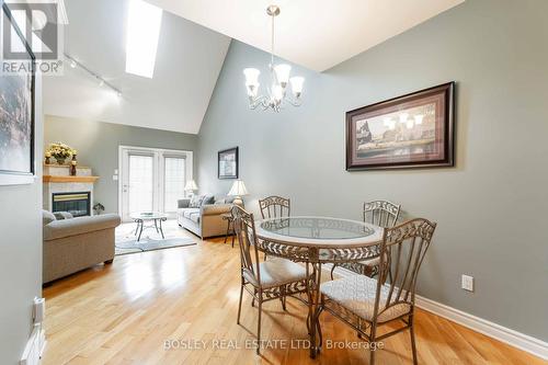14 - 308 Queenston Street, St. Catharines (Oakdale), ON - Indoor Photo Showing Dining Room With Fireplace