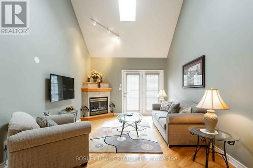 14 - 308 Queenston Street, St. Catharines (Oakdale), ON - Indoor Photo Showing Living Room With Fireplace