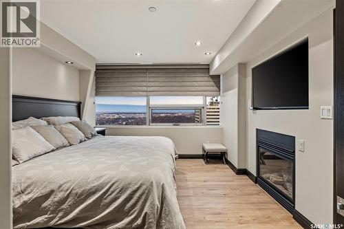 Ph208 1914 Hamilton Street, Regina, SK - Indoor Photo Showing Bedroom With Fireplace