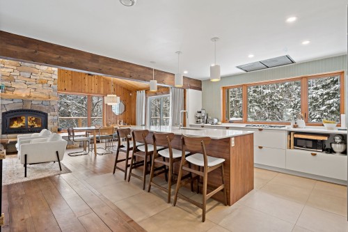 Cuisine - 25 Mtée Laurence, Brébeuf, QC - Indoor Photo Showing Dining Room With Fireplace