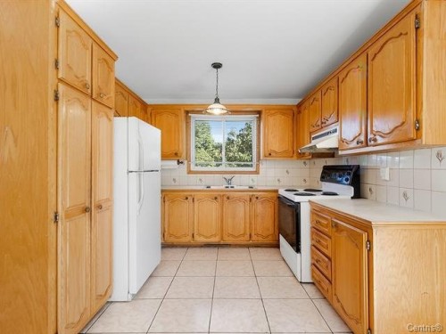 Cuisine - 1010 Rue Ridgewood, Laval (Chomedey), QC - Indoor Photo Showing Kitchen With Double Sink