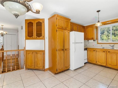 Cuisine - 1010 Rue Ridgewood, Laval (Chomedey), QC - Indoor Photo Showing Kitchen With Double Sink