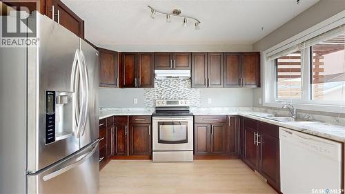5128 Aerial Crescent, Regina, SK - Indoor Photo Showing Kitchen With Stainless Steel Kitchen