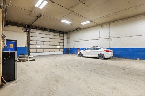 Garage - 701 Rue Des Ateliers, Boucherville, QC - Indoor Photo Showing Garage