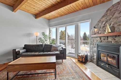 Salon - 542-2271 Rue Du Versant, Magog, QC - Indoor Photo Showing Living Room With Fireplace