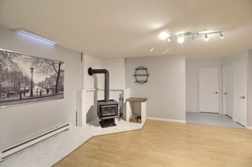 Salle familiale - 277 Route 111, Val-D'Or, QC - Indoor With Fireplace