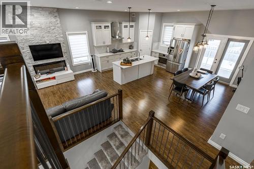 602 Kloppenburg Terrace, Saskatoon, SK - Indoor Photo Showing Living Room With Fireplace