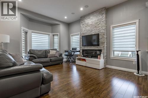 602 Kloppenburg Terrace, Saskatoon, SK - Indoor Photo Showing Living Room With Fireplace