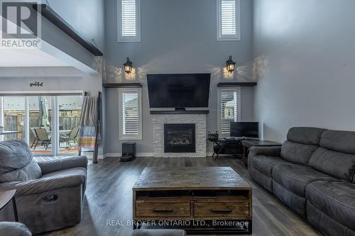 Living area with 18' ceiling - 50 Gaiser Road, Welland (Coyle Creek), ON - Indoor Photo Showing Living Room With Fireplace