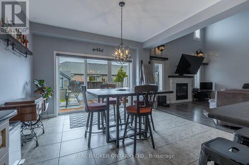 50 Gaiser Road, Welland (Coyle Creek), ON - Indoor Photo Showing Dining Room With Fireplace