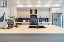 42 Creekview Avenue SW  Calgary, AB T2X 6M1