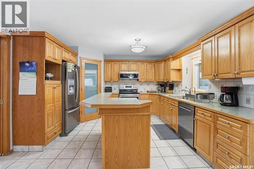 3148 Wimbledon Bay, Regina, SK - Indoor Photo Showing Kitchen With Double Sink