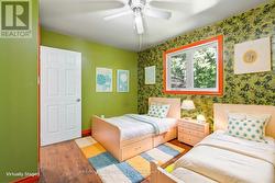 2nd bedroom, virtually staged as child's room - 