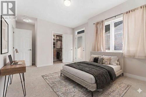 This image has been virtually staged. - 109 Pilot Private, Ottawa, ON - Indoor Photo Showing Bedroom
