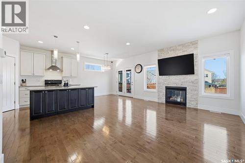 526 Patrick Avenue, Saskatoon, SK - Indoor Photo Showing Other Room With Fireplace