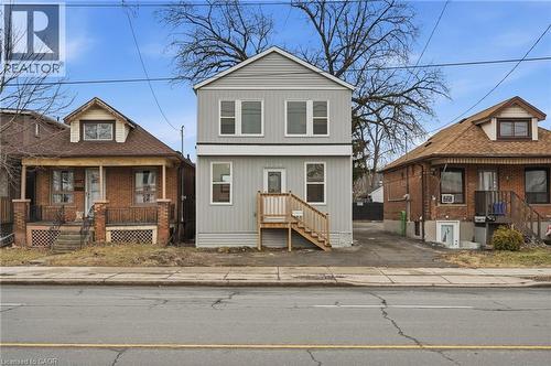 View of front facade featuring a porch - 1278 Main Street E, Hamilton, ON - Outdoor With Facade
