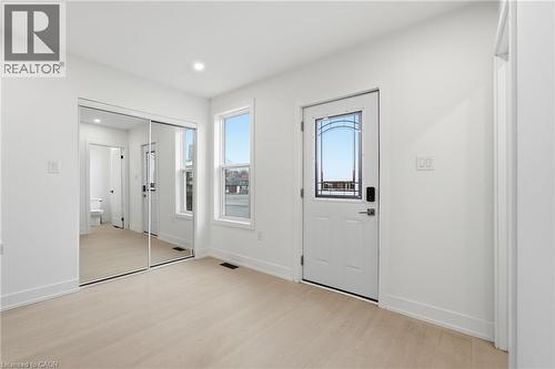 Entrance foyer featuring light wood-style floors and recessed lighting - 1278 Main Street E, Hamilton, ON - Indoor Photo Showing Other Room