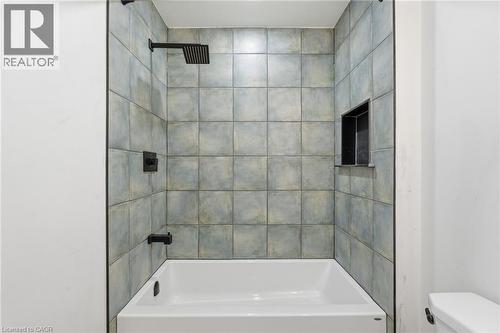 Full bath featuring toilet and shower / washtub combination - 1278 Main Street E, Hamilton, ON - Indoor Photo Showing Bathroom