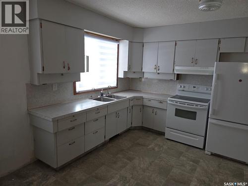 643 Main Street, Annaheim, SK - Indoor Photo Showing Kitchen With Double Sink