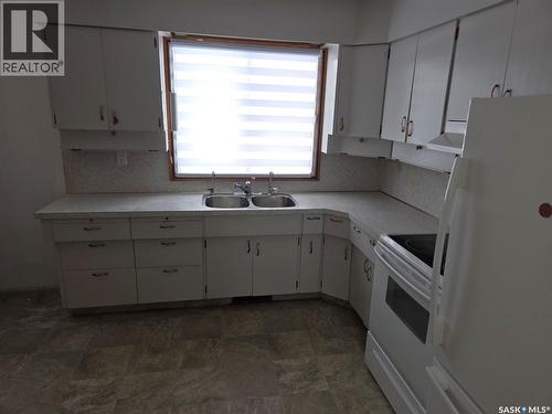 643 Main Street, Annaheim, SK - Indoor Photo Showing Kitchen With Double Sink