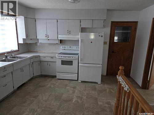643 Main Street, Annaheim, SK - Indoor Photo Showing Kitchen With Double Sink