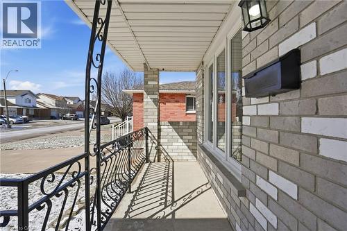 Covered porch with a residential view - 513 Rexford Drive, Hamilton, ON - Outdoor