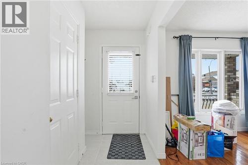 Doorway to outside featuring baseboards - 513 Rexford Drive, Hamilton, ON - Indoor Photo Showing Other Room