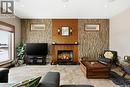 7502 Lilac Place, Regina, SK  - Indoor Photo Showing Living Room With Fireplace 