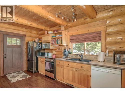 7540 Mccarthy Road, Bridge Lake, BC - Indoor Photo Showing Kitchen With Double Sink