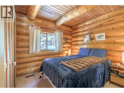 7540 Mccarthy Road, Bridge Lake, BC - Indoor Photo Showing Bedroom
