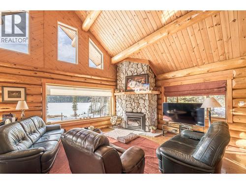 7540 Mccarthy Road, Bridge Lake, BC - Indoor Photo Showing Living Room With Fireplace