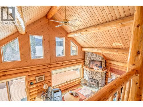 7540 Mccarthy Road, Bridge Lake, BC - Indoor Photo Showing Other Room With Fireplace