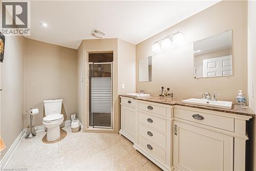 Full bathroom featuring double vanity and a shower stall - 120 Valiant Circle, Hamilton, ON - Indoor Photo Showing Bathroom