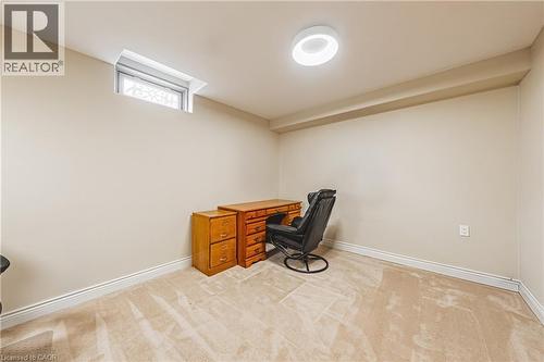 Office area featuring light colored carpet and baseboards - 120 Valiant Circle, Hamilton, ON - Indoor