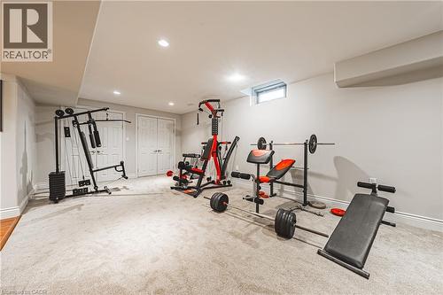 Exercise area with carpet flooring and recessed lighting - 120 Valiant Circle, Hamilton, ON - Indoor Photo Showing Gym Room