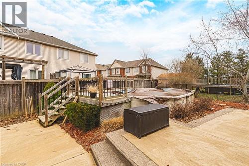 Wooden deck with a covered pool, a fenced backyard, and a patio area - 120 Valiant Circle, Hamilton, ON - Outdoor With Deck Patio Veranda