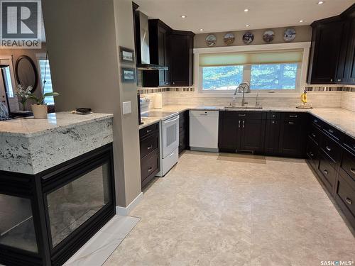 314 Milden Street, Conquest, SK - Indoor Photo Showing Kitchen With Fireplace With Upgraded Kitchen