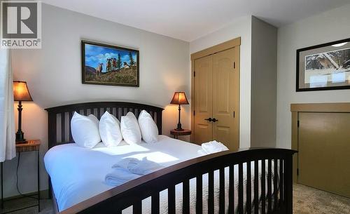Main Floor Bedroom - 6844 Madrid Way Unit# 321, Fintry, BC - Indoor Photo Showing Bedroom