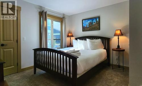 6844 Madrid Way Unit# 321, Fintry, BC - Indoor Photo Showing Bedroom