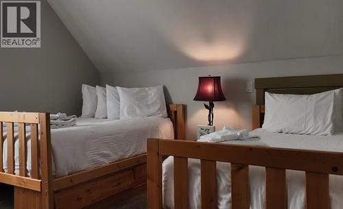 Loft - 6844 Madrid Way Unit# 321, Fintry, BC - Indoor Photo Showing Bedroom