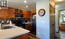 6844 Madrid Way Unit# 321, Fintry, BC  - Indoor Photo Showing Kitchen With Double Sink 
