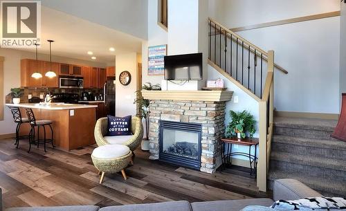 6844 Madrid Way Unit# 321, Fintry, BC - Indoor Photo Showing Living Room With Fireplace
